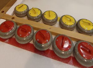 Red and Yellow Curling Stones